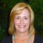 a photo of graduate, Colleen Stowe, smiling to the camera