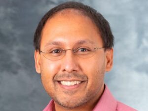 Professional headshot photo of Jon Audhya